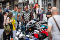 crowd-around-bikes
