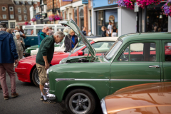 green-car-with-bonnet-open-